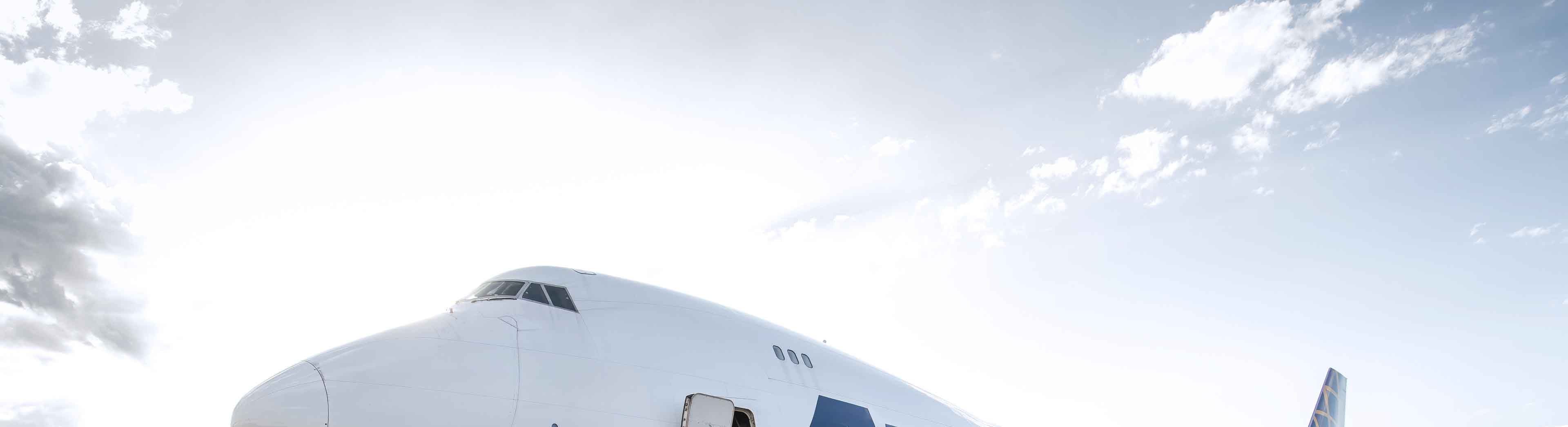 airplane standing on the field ready to be loaded
