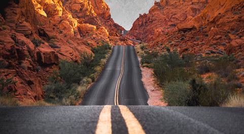 road in between mountains