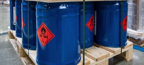 barrels with chemicals on a pallet
