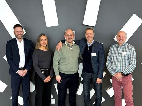 Group photo of people smiling