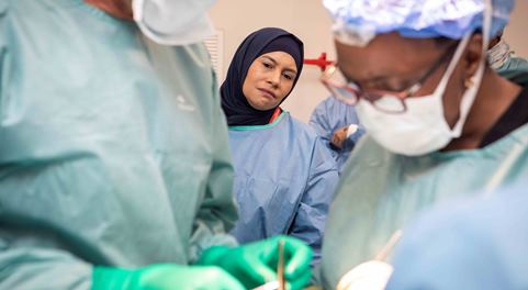 DSV representative viewing a cleft lip surgery done by Operation Smile volunteers