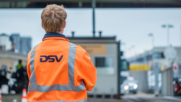 DSV staff standing in front of the customs gate