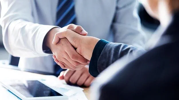 Business people shaking hands