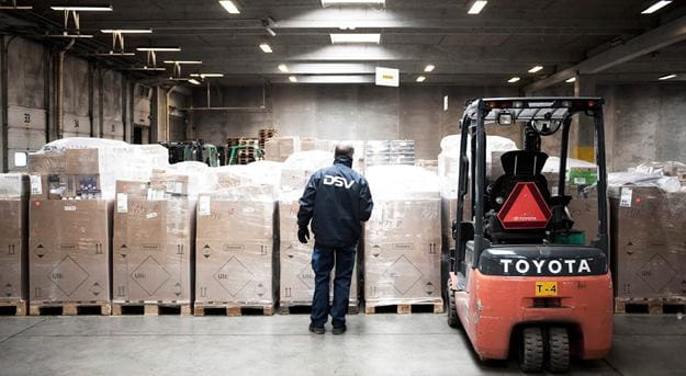DSV warehouse operator moving products with a forklift