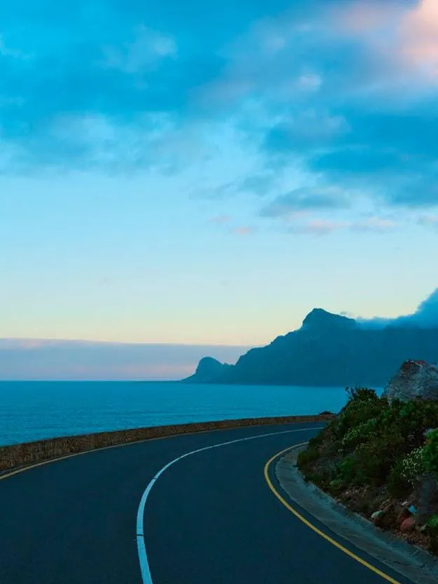 Road overviewing the mountains and sea