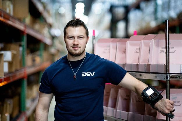 Male warehouse worker in a DSV warehouse