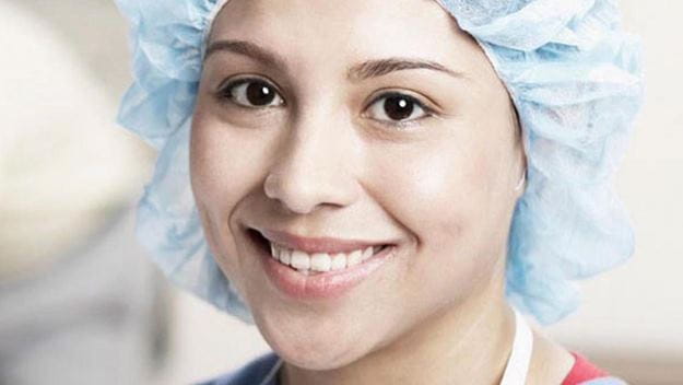 A picture of a woman who smiles in healthcare