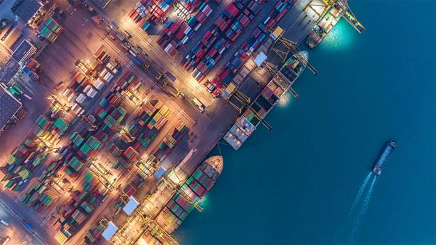 Harbor filled with containers and docked ships
