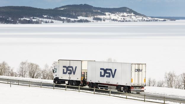 Truck on a road full of snow
