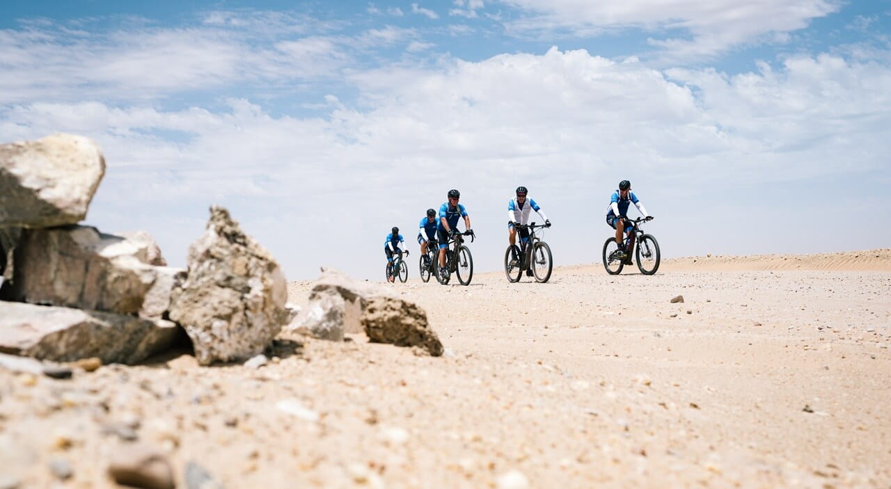 Change a life cycle tour 2025 riders in the harsh desert environment of Namibia