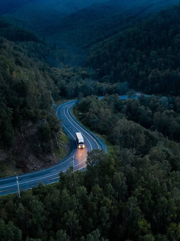 Truck's lights shining bright providing high visibility