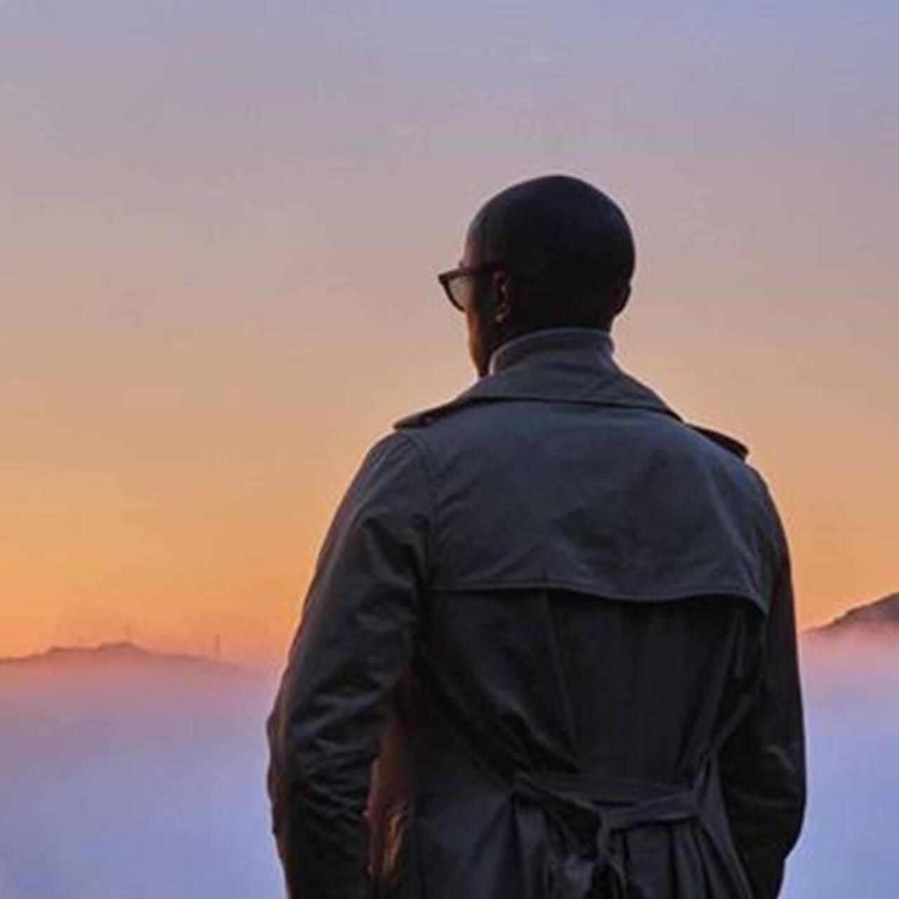 Gentleman in a coat looking into the distance thinking about how DSV helped his ecommerce company grow