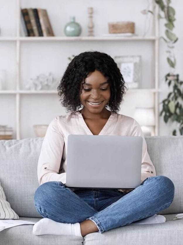 Female ecommerce business owner browsing DSV's solutions to simplify her retail logistics