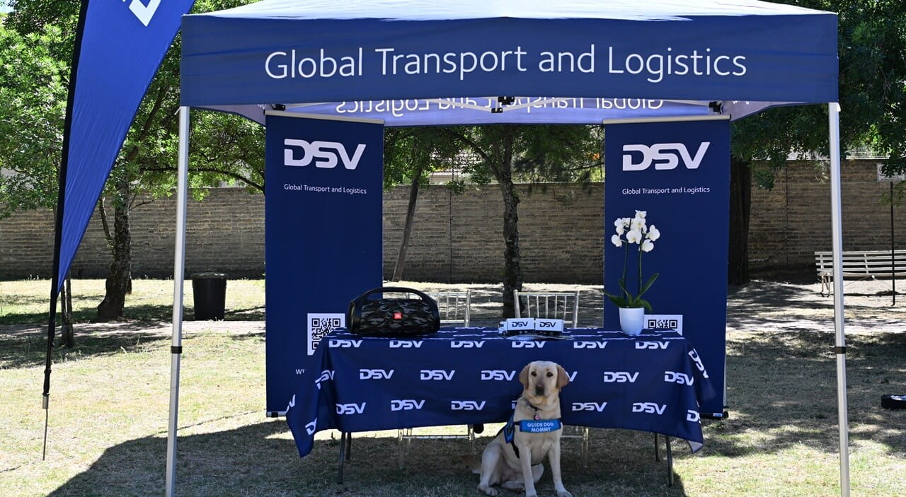 SA Guide dog mommy dog infront of DSV stand at shades day launch