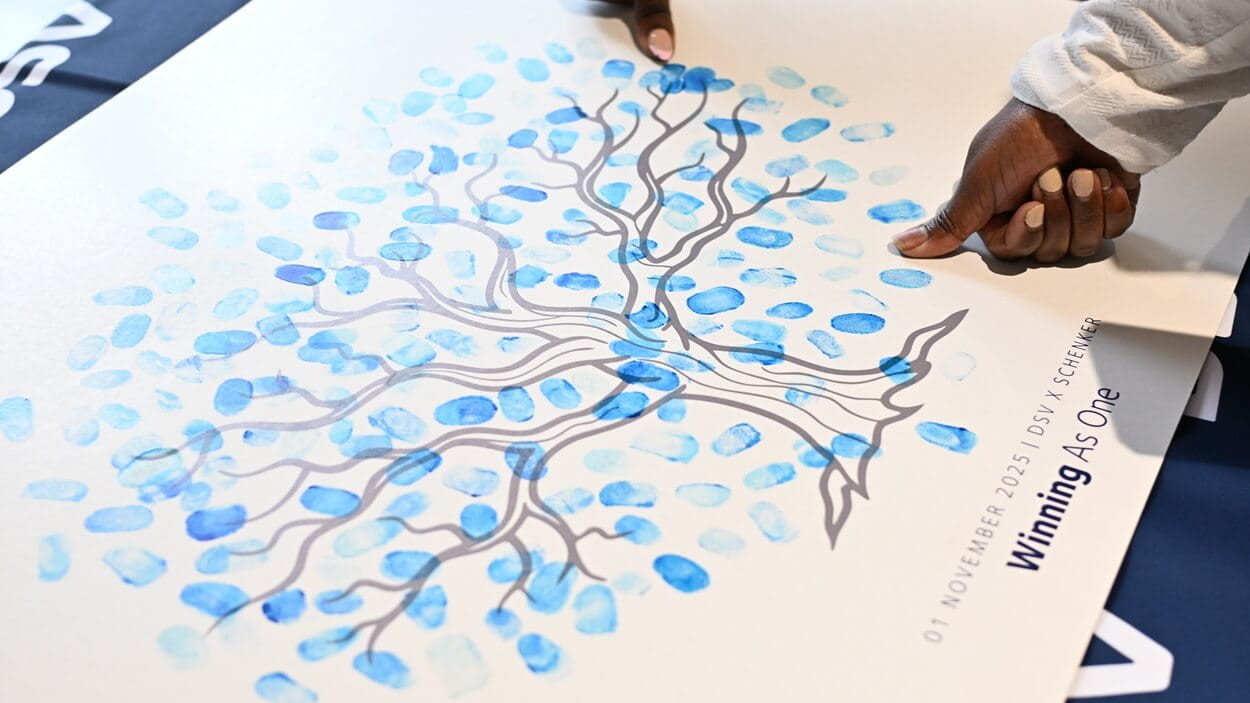 DSV employees engaging with fun activities at the go-live celebration in South Africa